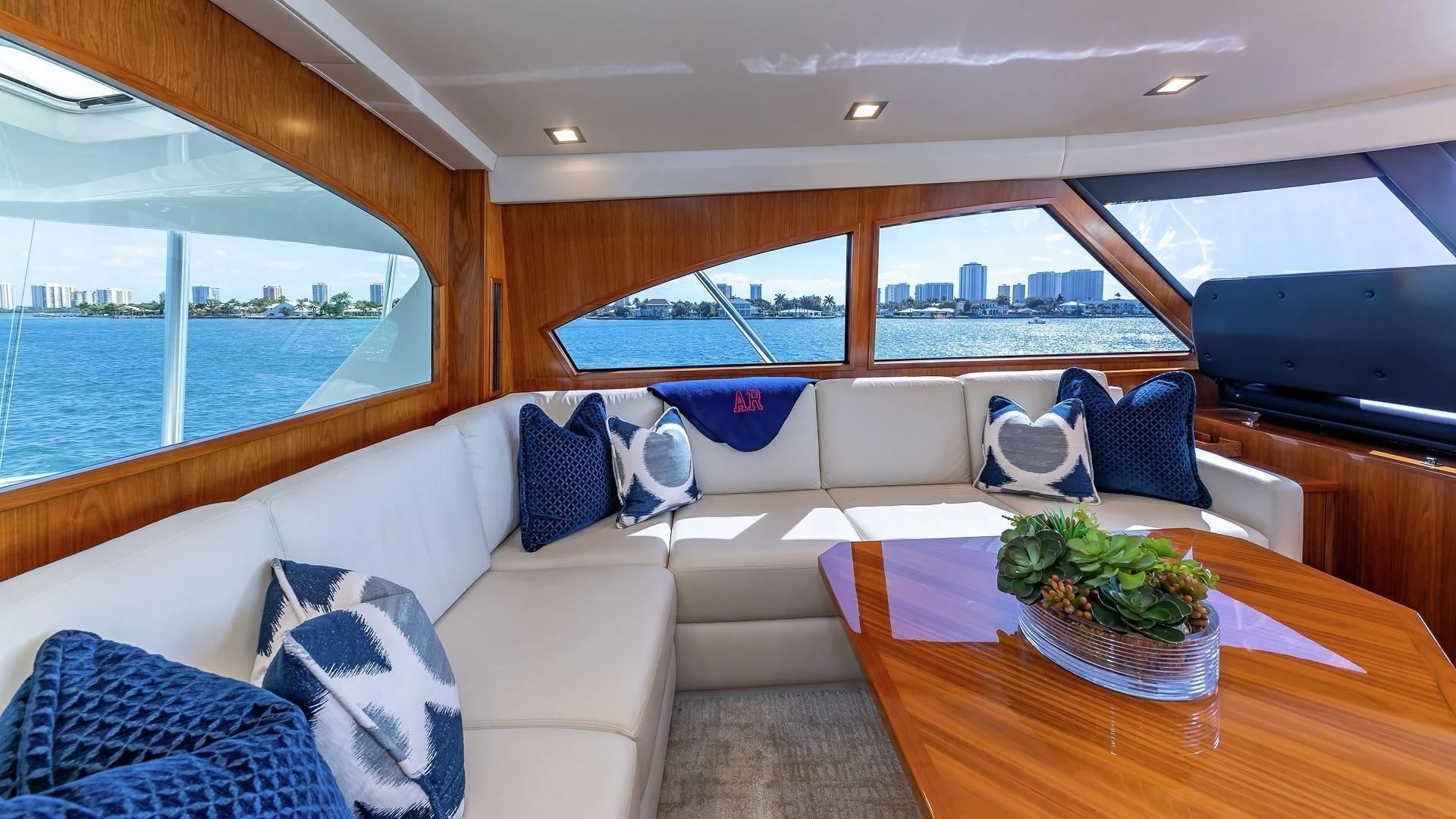 a living room with a large window aboard AUSSIE RULES Yacht for Sale