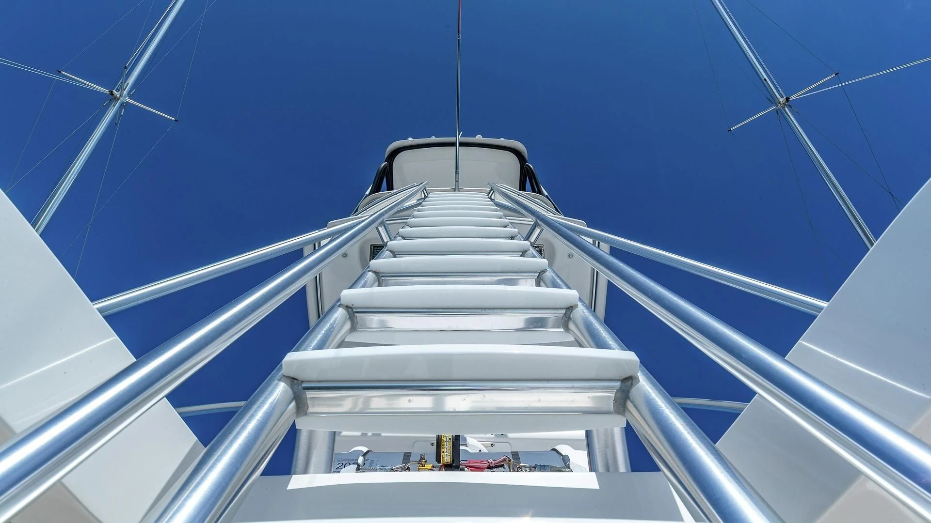 a white staircase with a blue sky aboard AUSSIE RULES Yacht for Sale