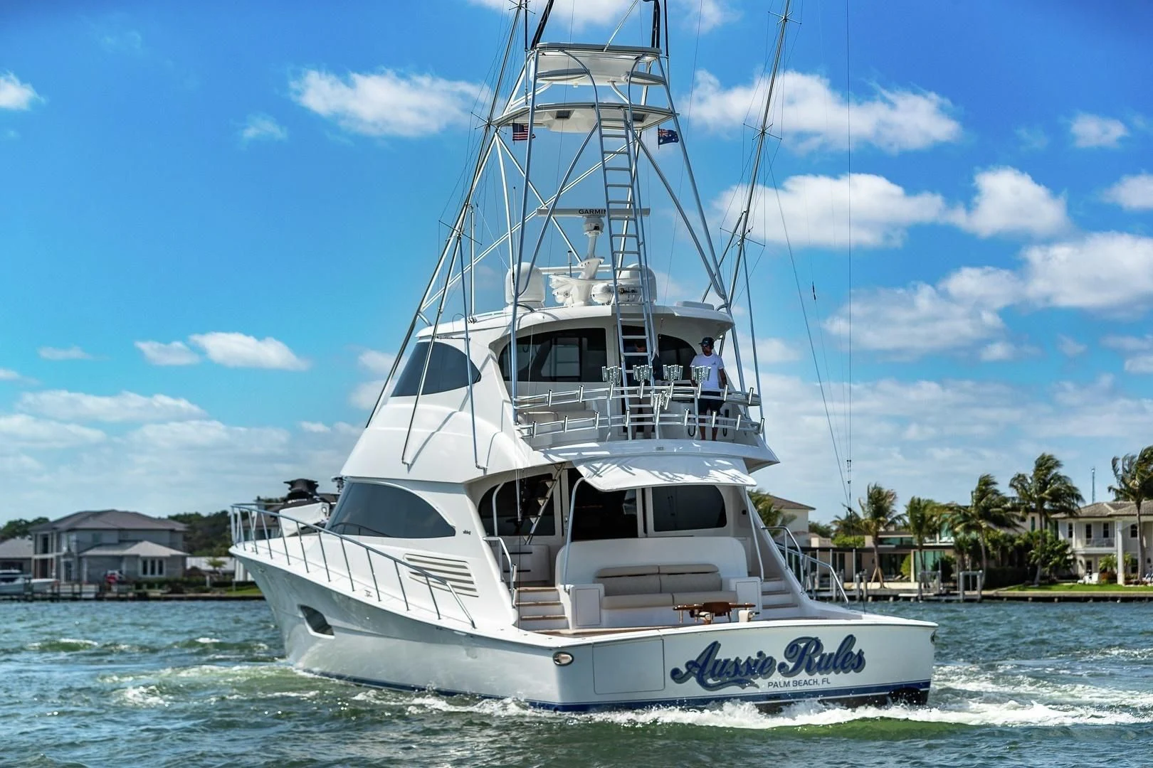 a white boat in the water aboard AUSSIE RULES Yacht for Sale