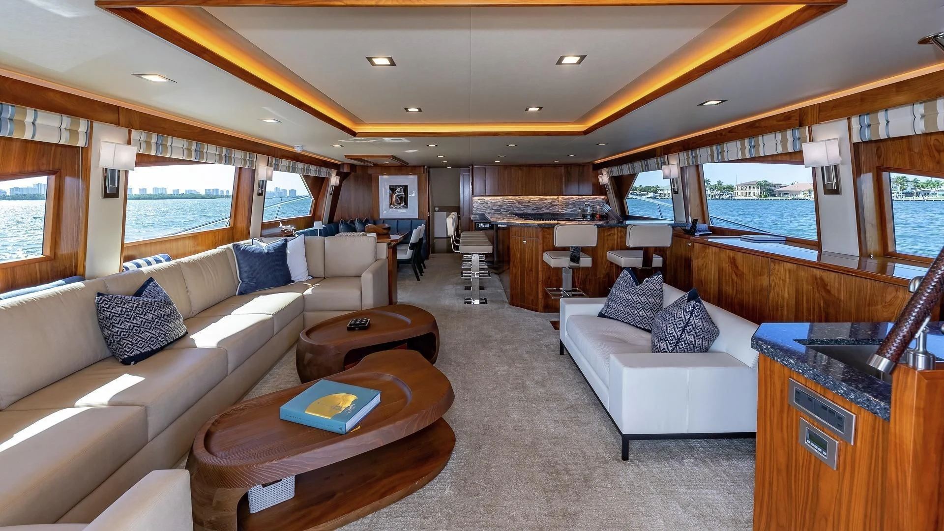 a living room with a large window aboard AUSSIE RULES Yacht for Sale