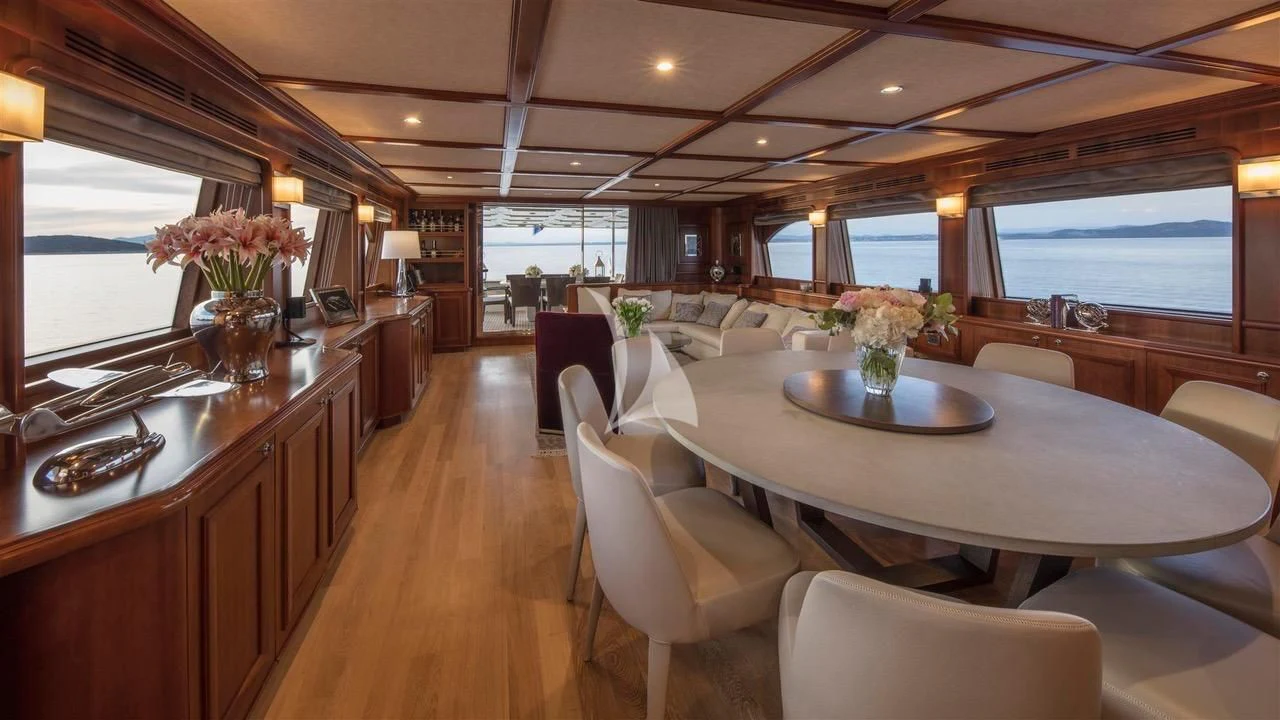 a large kitchen and dining room aboard ENA Yacht for Sale