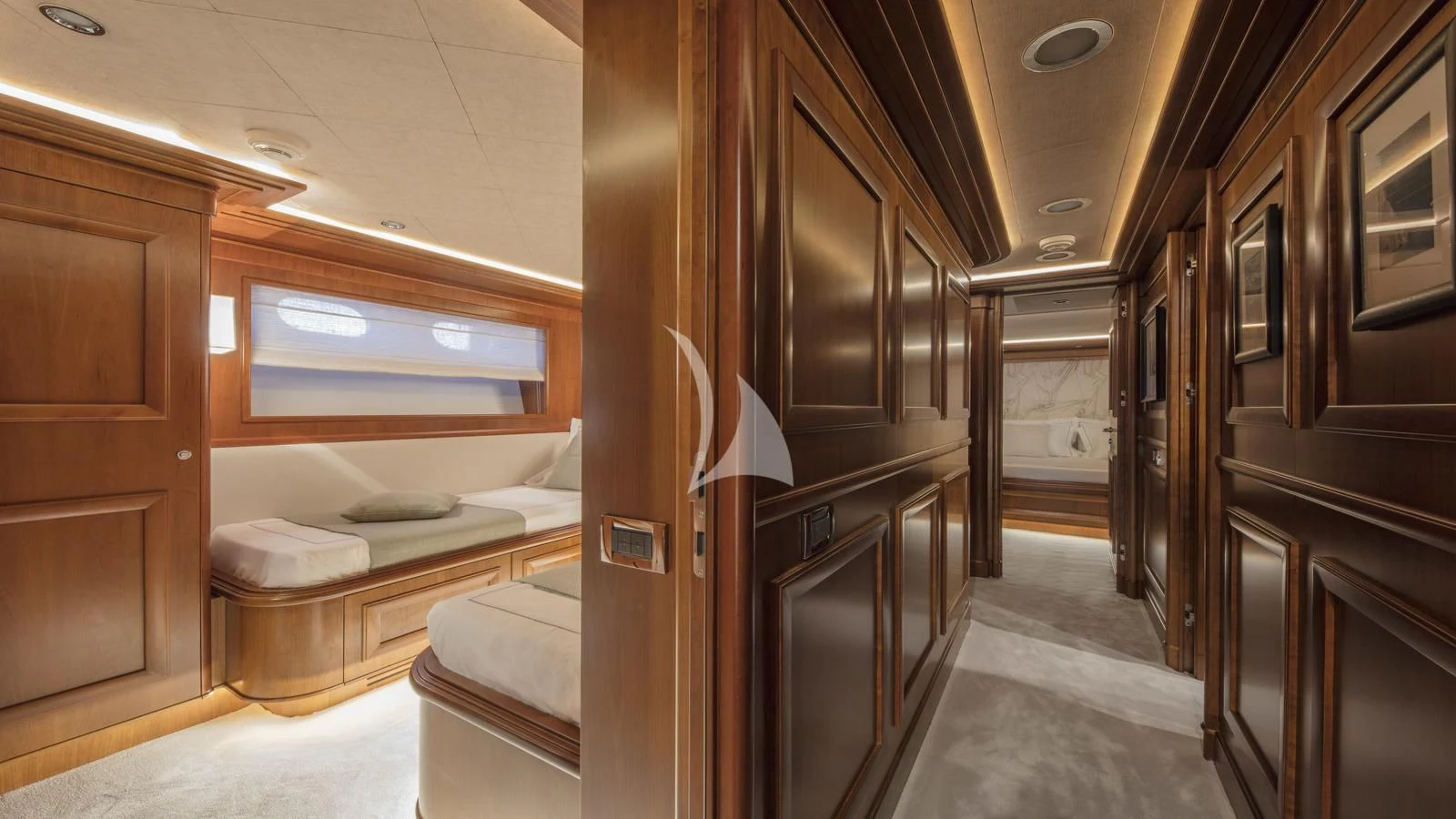 a room with a bed and a desk aboard ENA Yacht for Sale