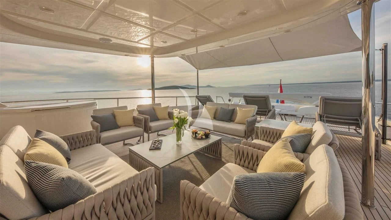 a living room with a large window aboard ENA Yacht for Sale