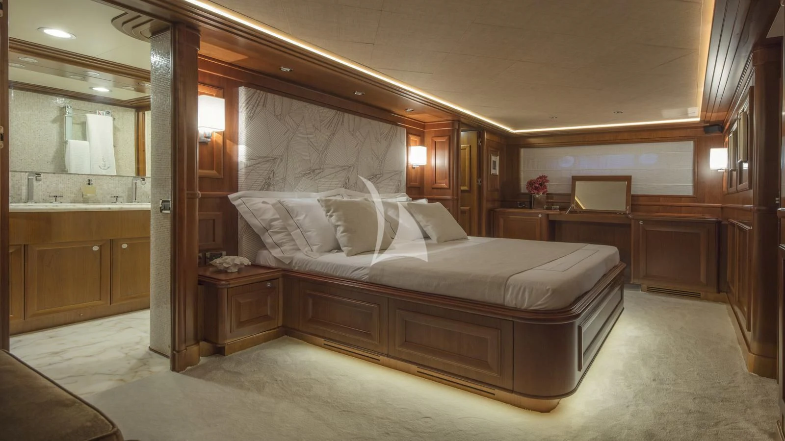 a large bedroom with a large bed aboard ENA Yacht for Sale