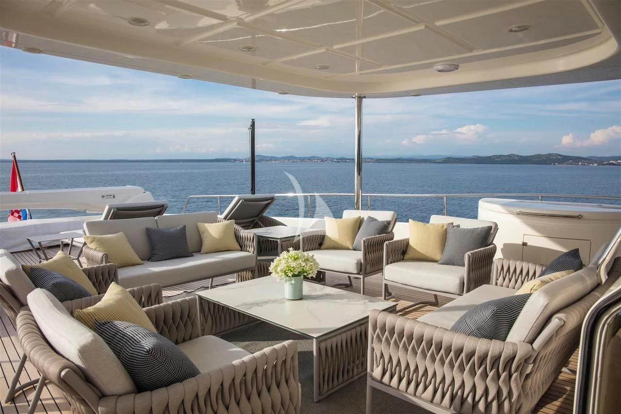 a living room with a large body of water aboard ENA Yacht for Sale