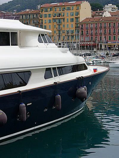 a boat docked at a pier aboard ENA Yacht for Sale