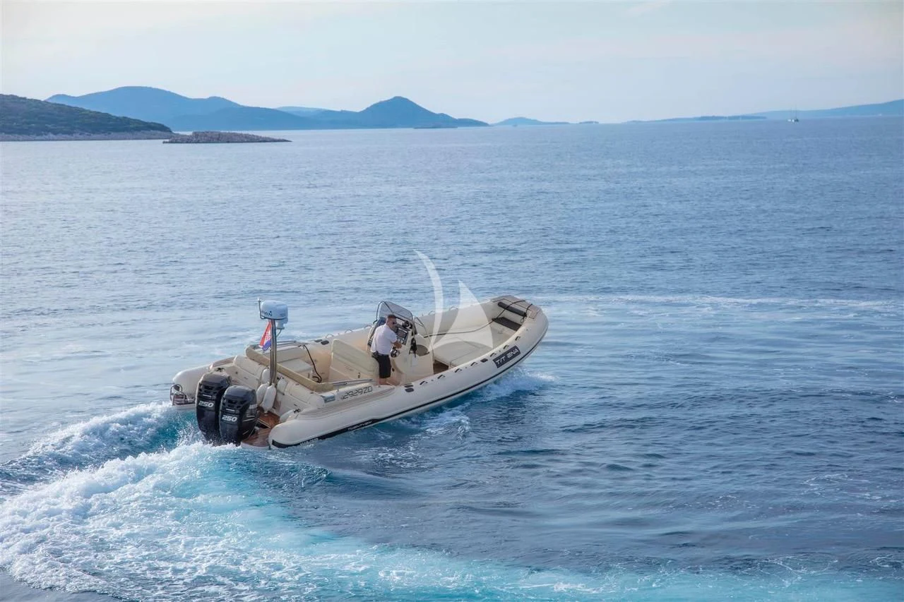 a person on a boat in the water aboard ENA Yacht for Sale