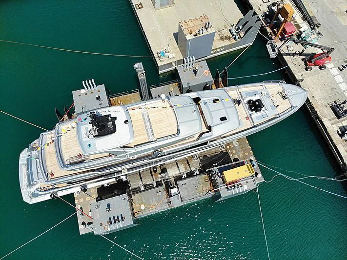 a large ship in the water aboard PAIZA ONE Yacht for Sale