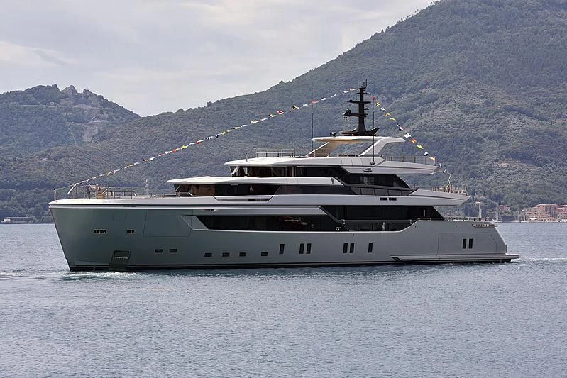 a large white boat in the water aboard PAIZA ONE Yacht for Sale