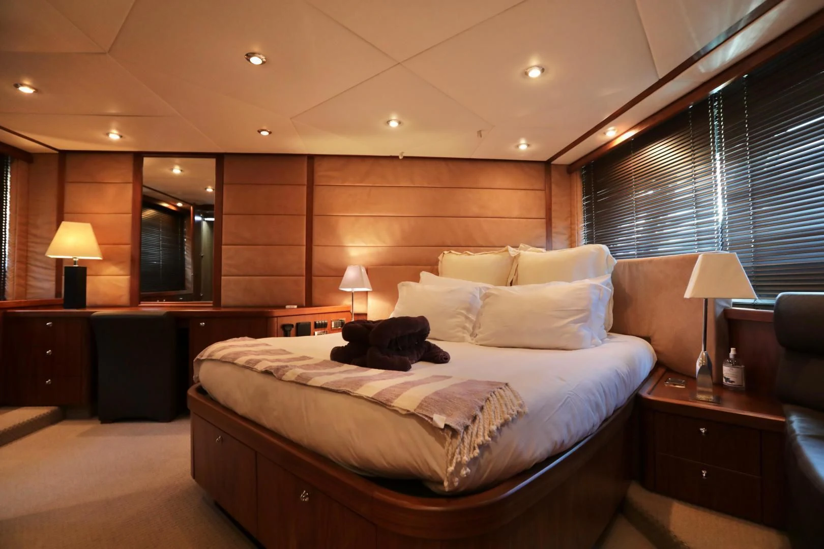 a bed in a hotel room aboard CAPRICHO II Yacht for Sale