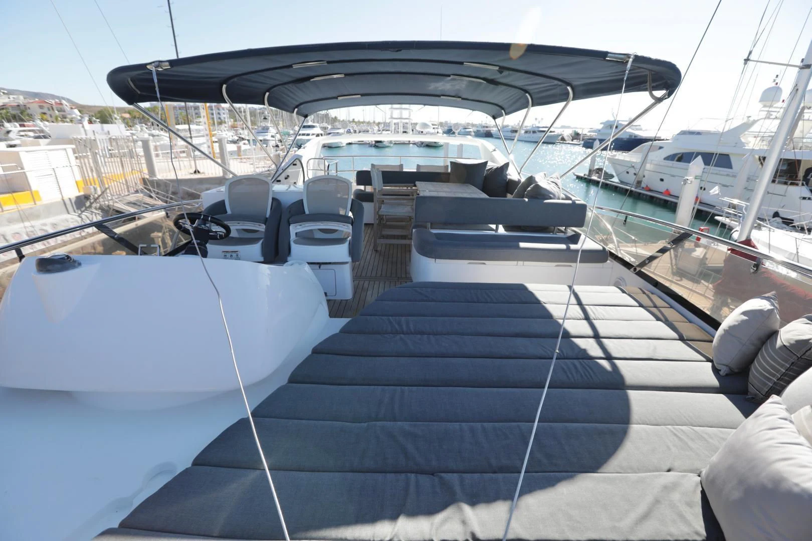 a boat dock with many boats aboard CAPRICHO II Yacht for Sale
