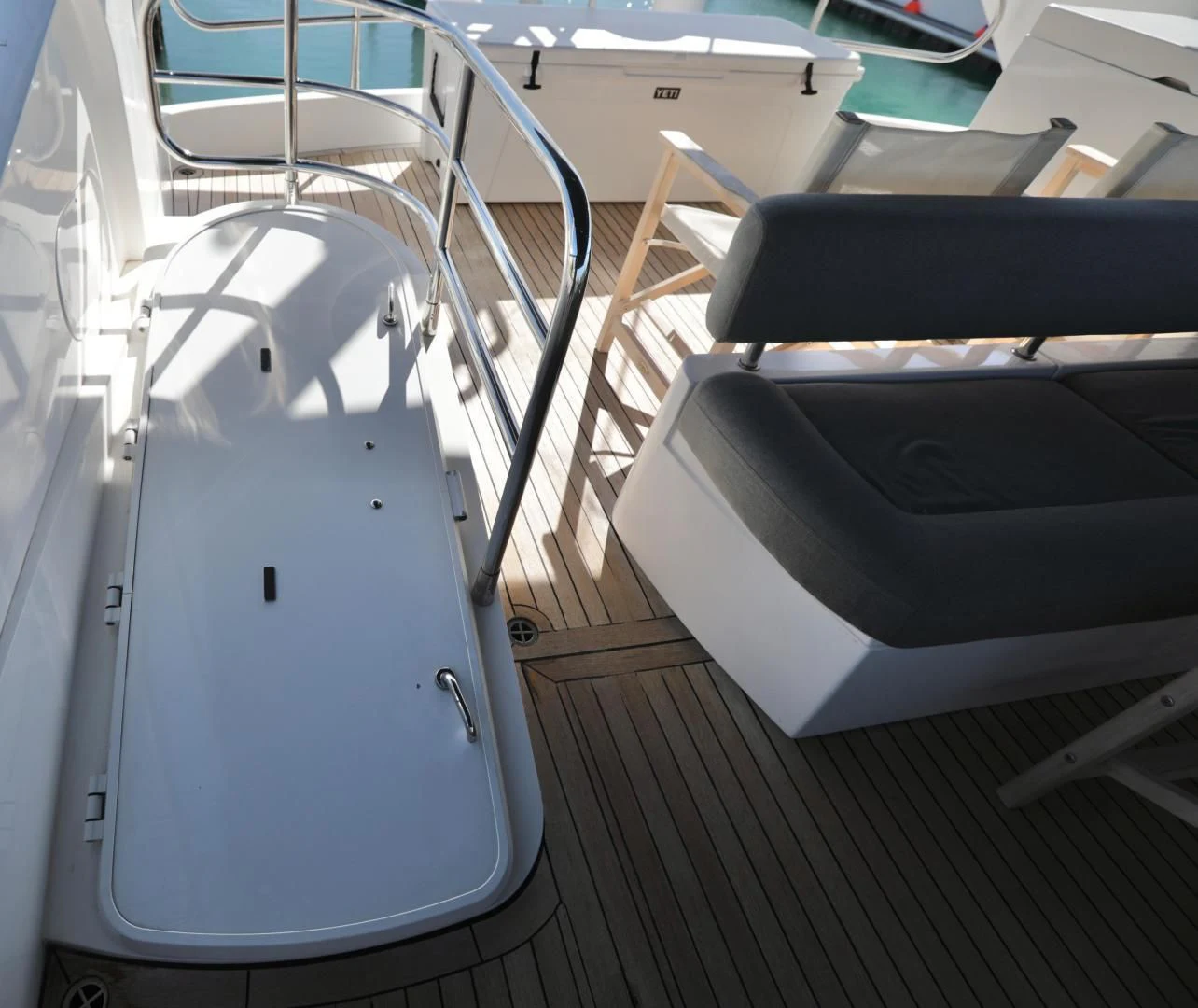 a room with a couple of chairs aboard CAPRICHO II Yacht for Sale