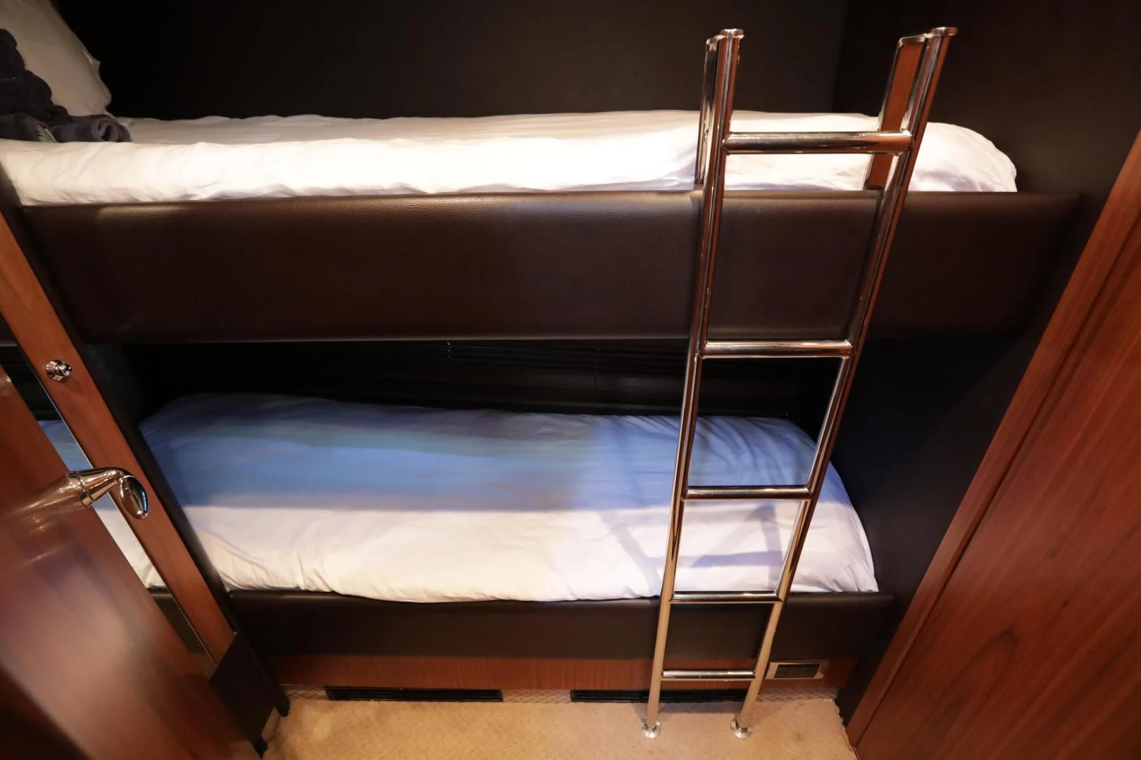 bunk beds in a room aboard CAPRICHO II Yacht for Sale