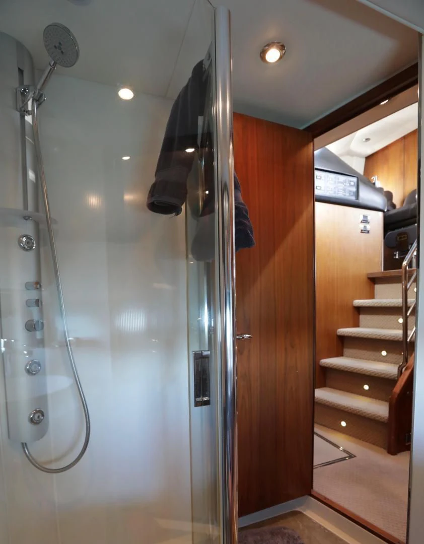 a shower unit in a bathroom aboard CAPRICHO II Yacht for Sale