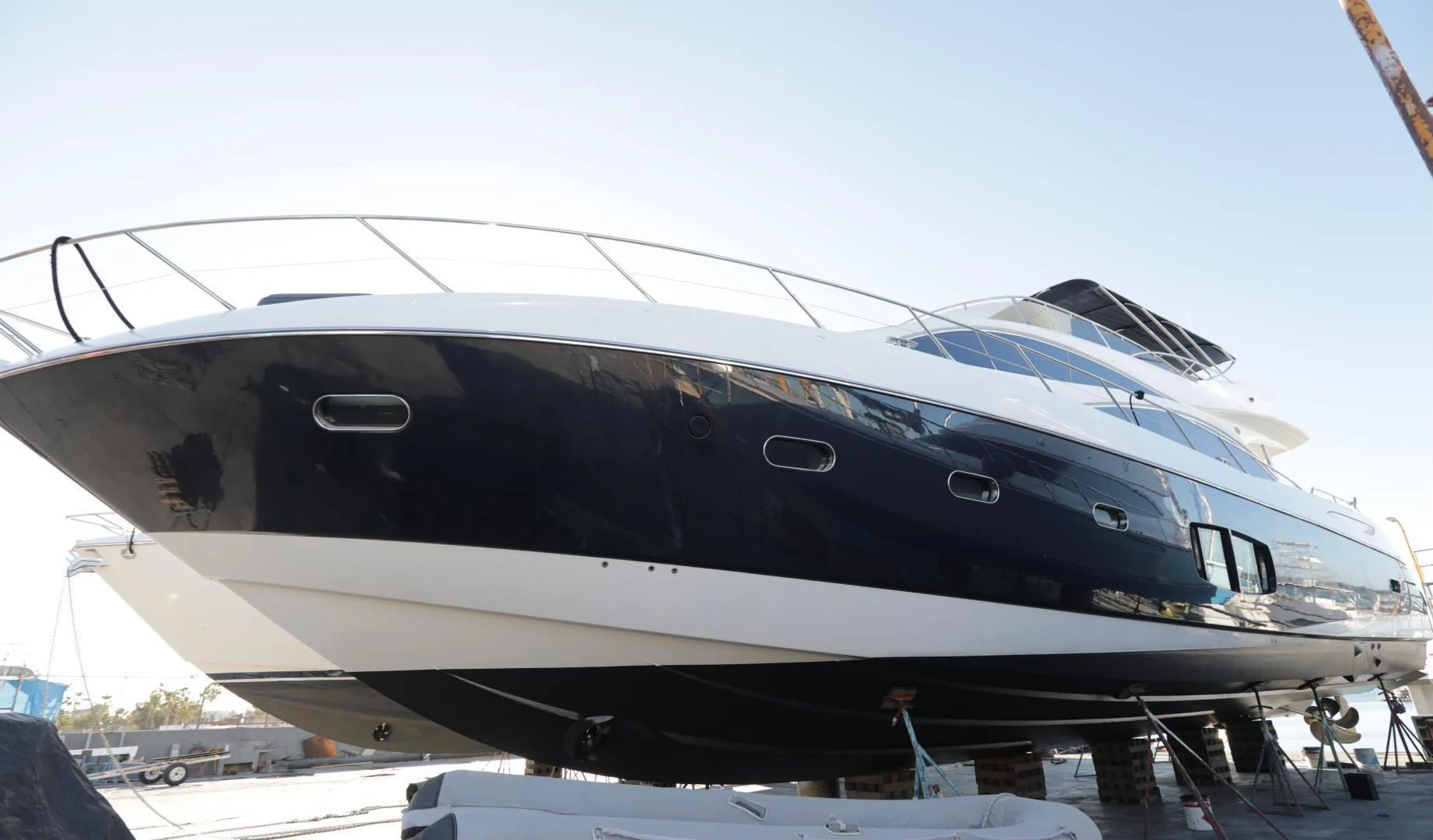 a yacht docked at a pier aboard CAPRICHO II Yacht for Sale