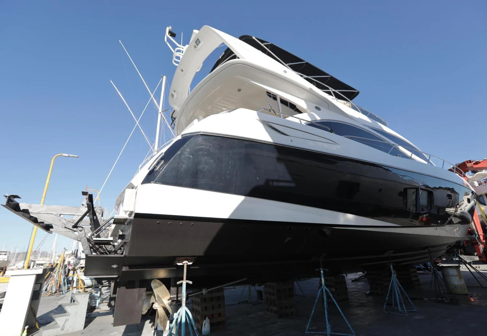 a white boat on a boat aboard CAPRICHO II Yacht for Sale