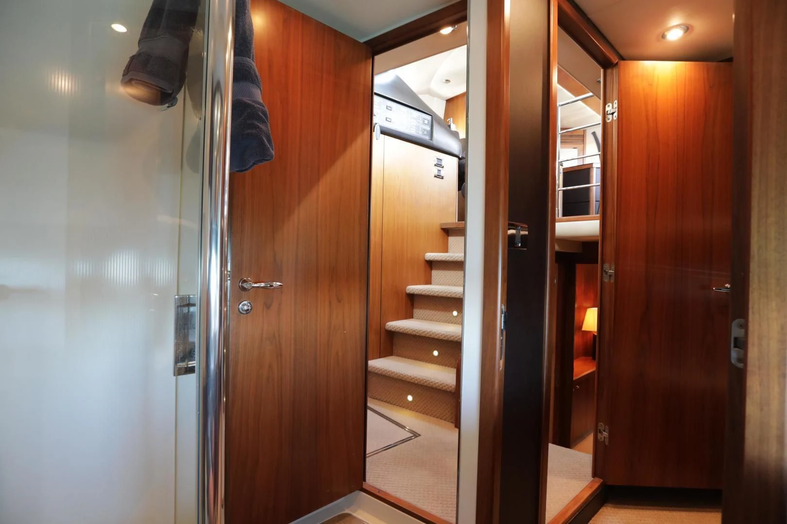 a room with wooden doors aboard CAPRICHO II Yacht for Sale