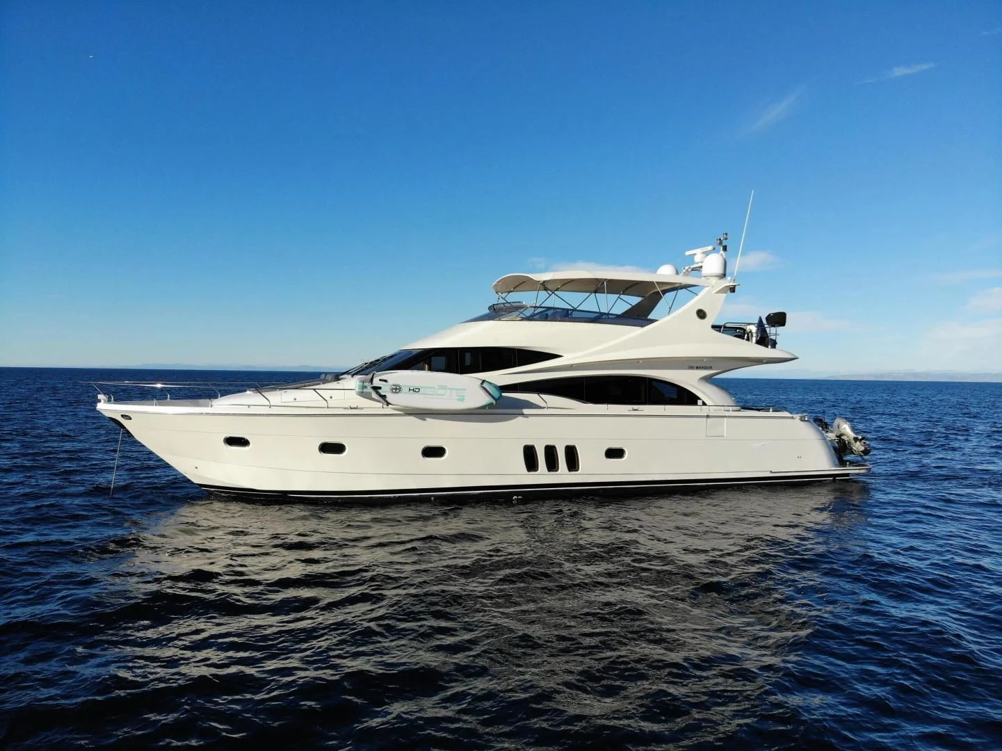 a white yacht on the water aboard STARTING OVER Yacht for Sale