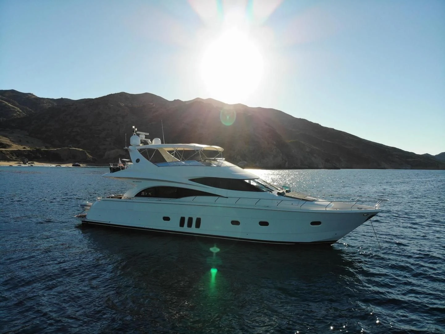 a white yacht on the water aboard STARTING OVER Yacht for Sale