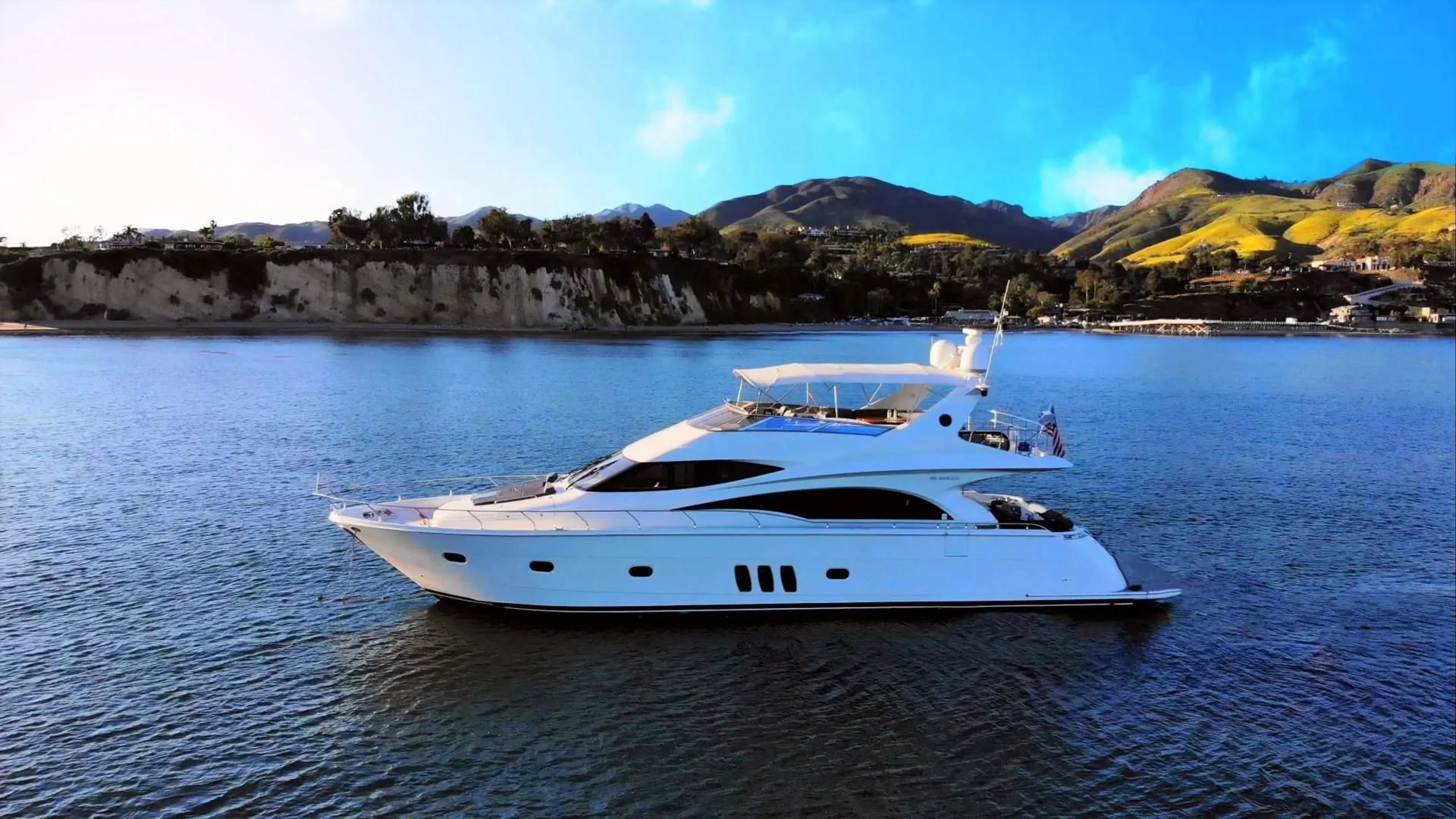 a white yacht on the water aboard STARTING OVER Yacht for Sale