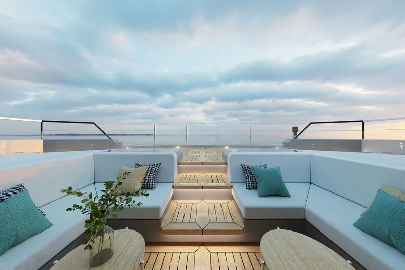 a room with a balcony and a view of the ocean aboard SILVERCAT 24M Yacht for Sale