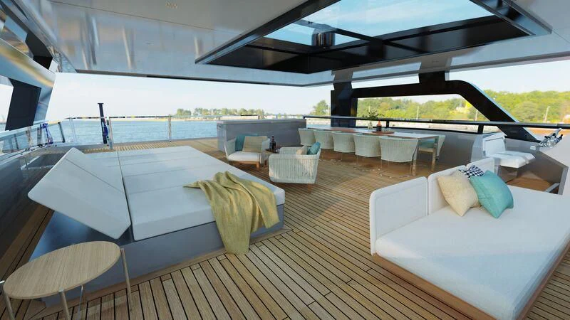 a large lounge area with a deck and chairs aboard SILVERCAT 24M Yacht for Sale