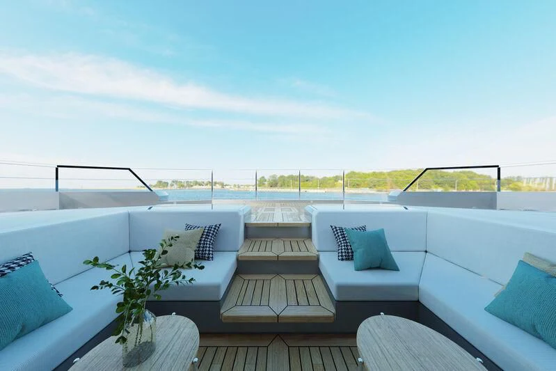 a balcony with a view of the ocean and the beach aboard SILVERCAT 24M Yacht for Sale