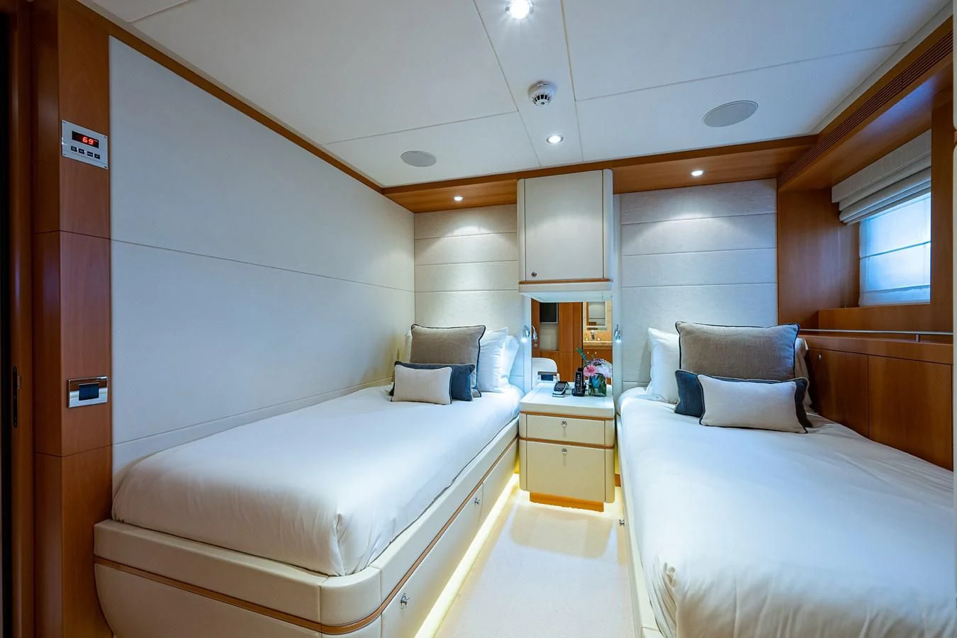 a room with two beds aboard SHARKFINN Yacht for Sale