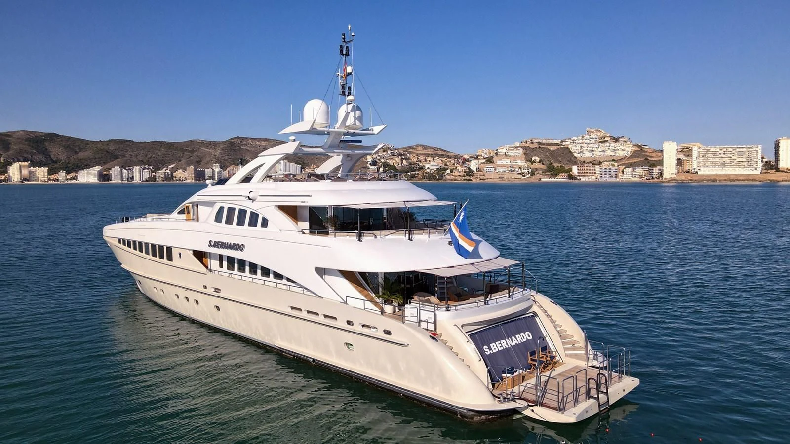 a large boat in the water aboard SHARKFINN Yacht for Sale