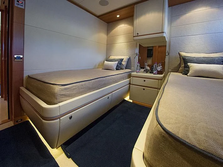 a room with two beds aboard SHARKFINN Yacht for Sale