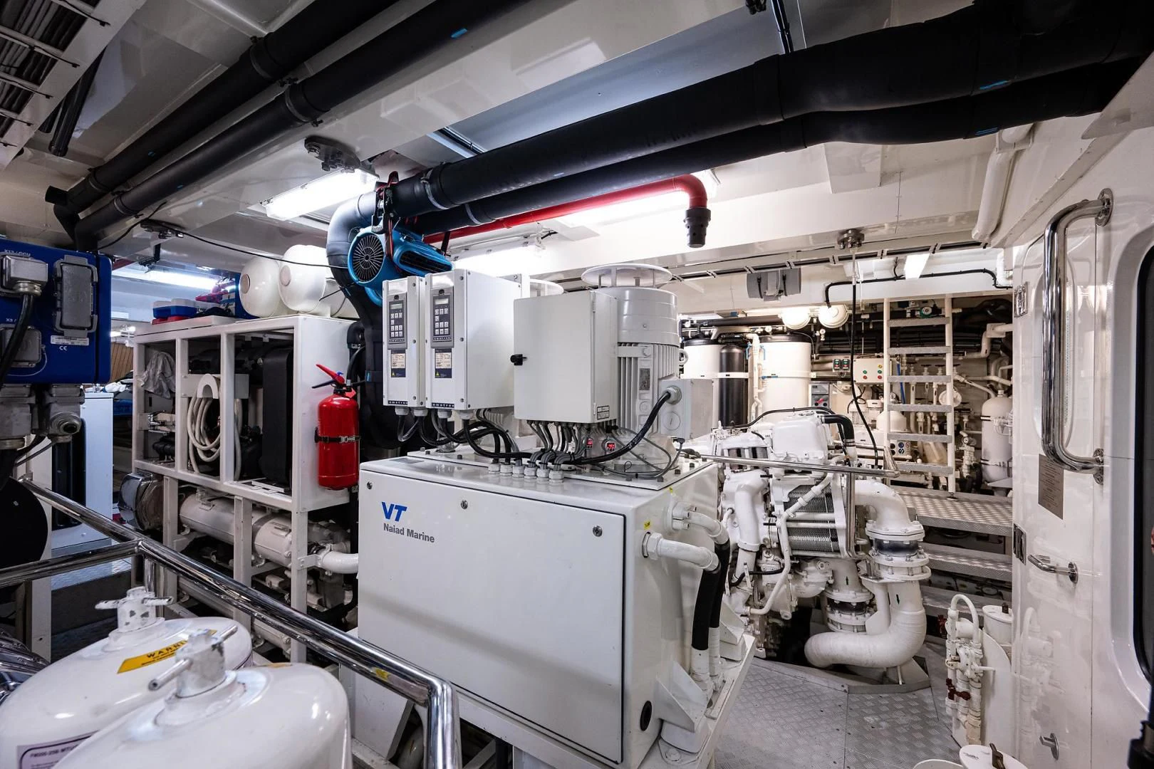 a large room with machinery aboard SHARKFINN Yacht for Sale