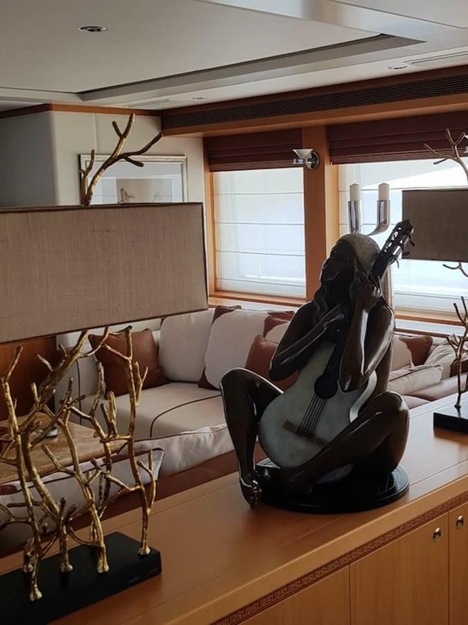 a black boot on a table aboard SHARKFINN Yacht for Sale