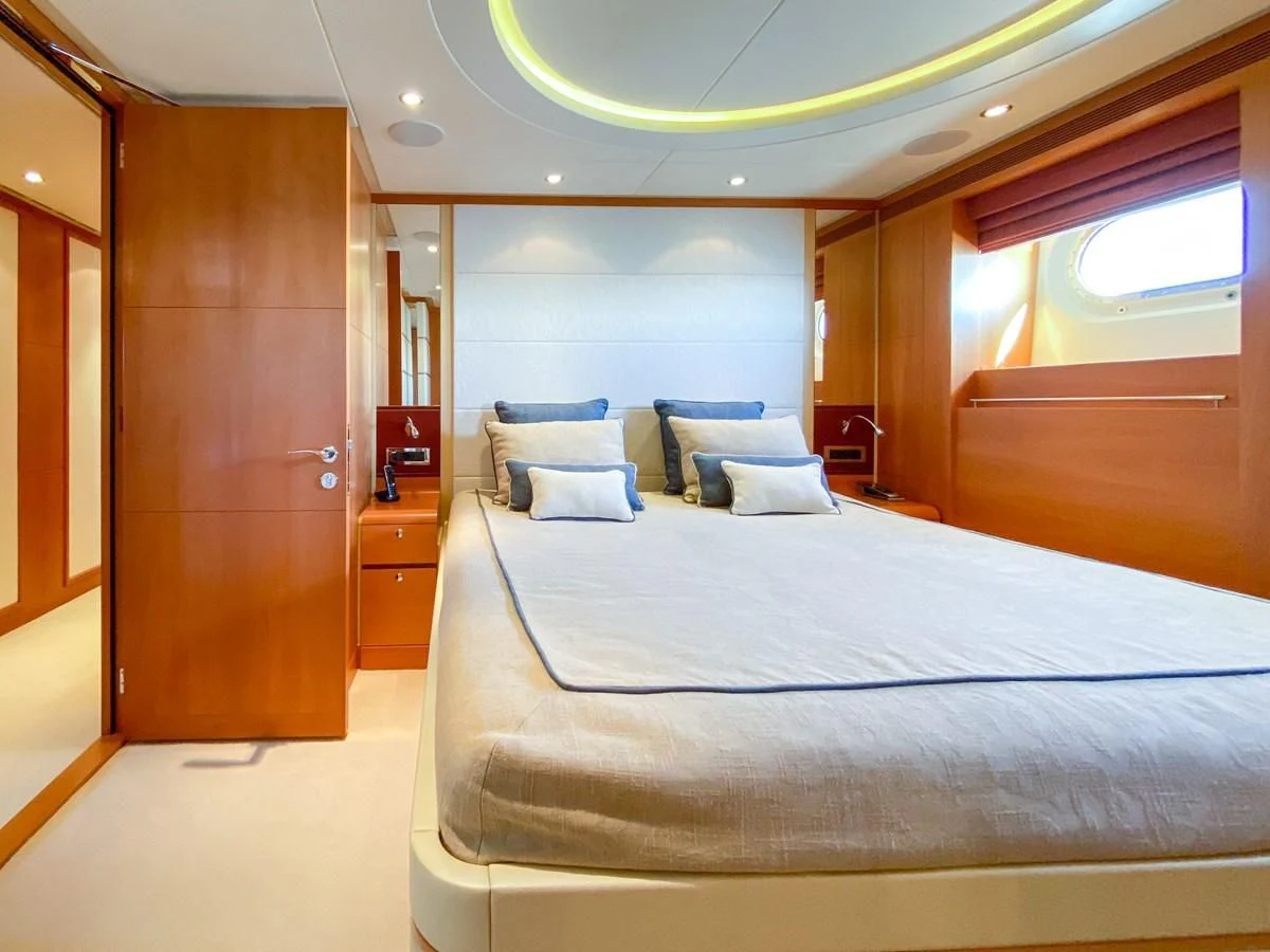 a bed in a room aboard SHARKFINN Yacht for Sale