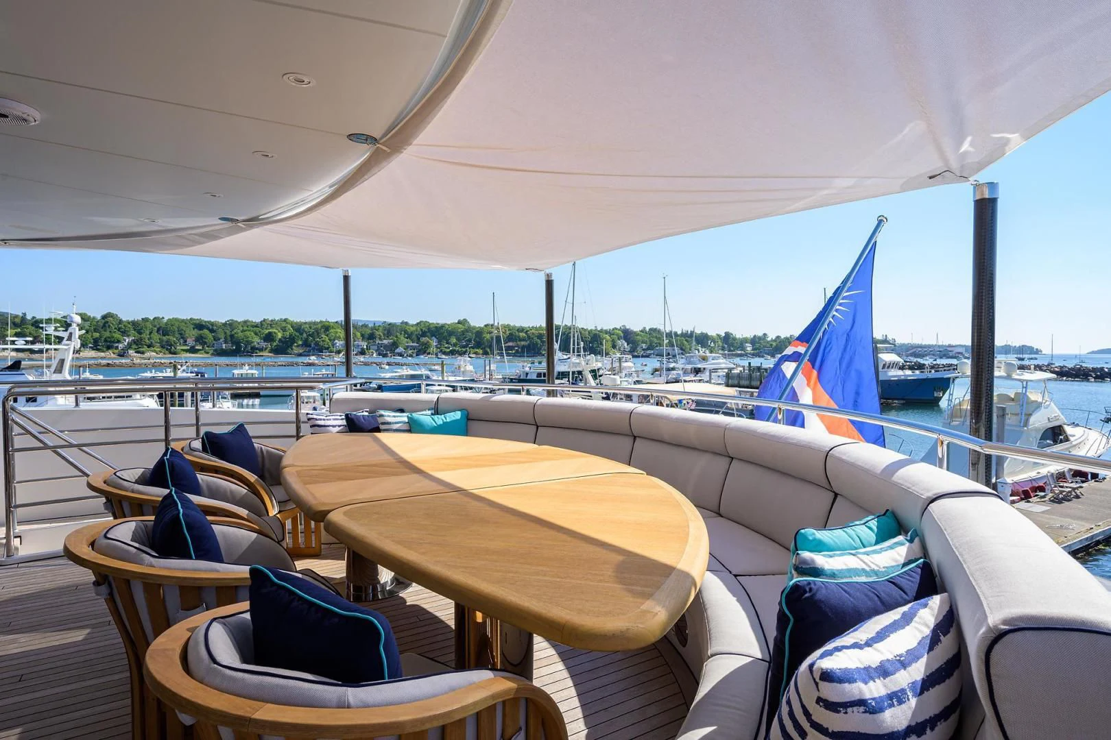 a table and chairs on a boat aboard SHARKFINN Yacht for Sale