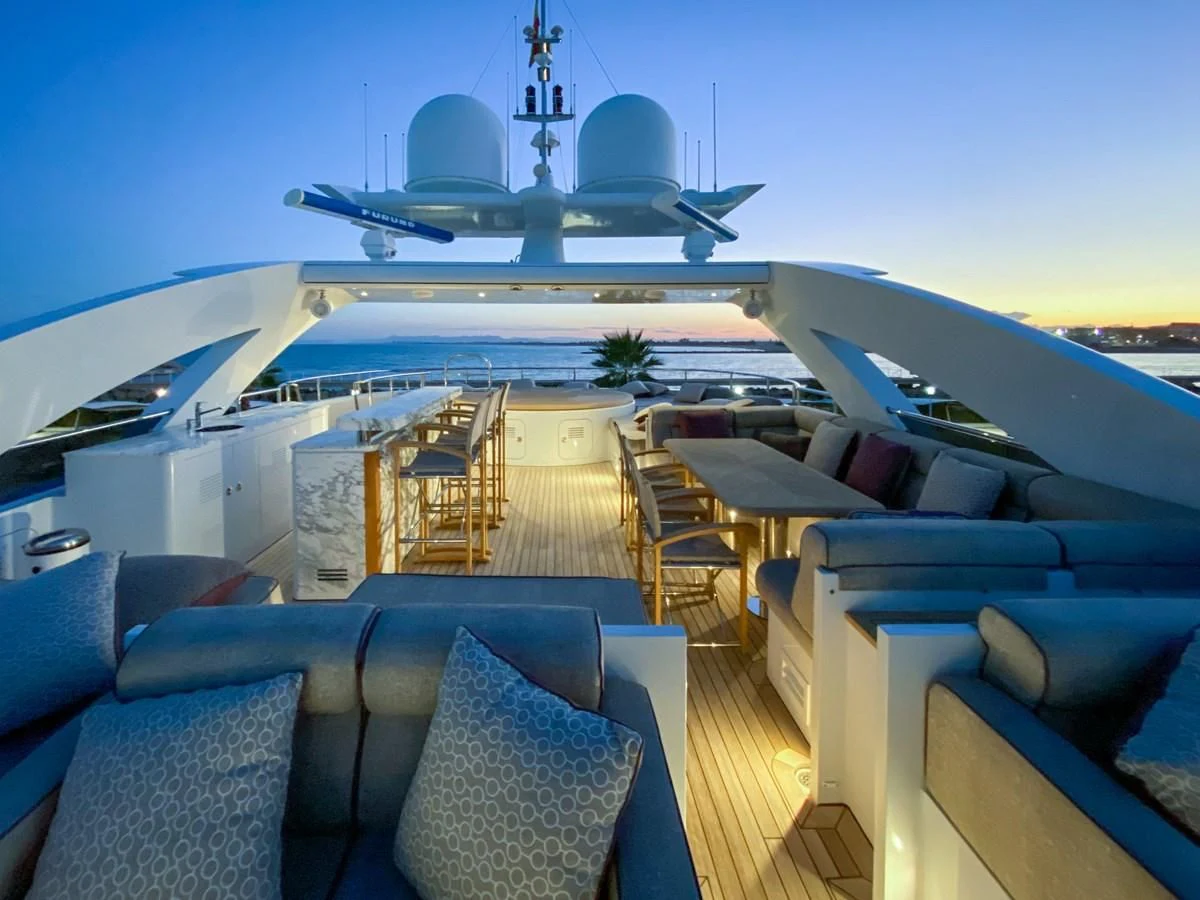 a large ship in the water aboard SHARKFINN Yacht for Sale
