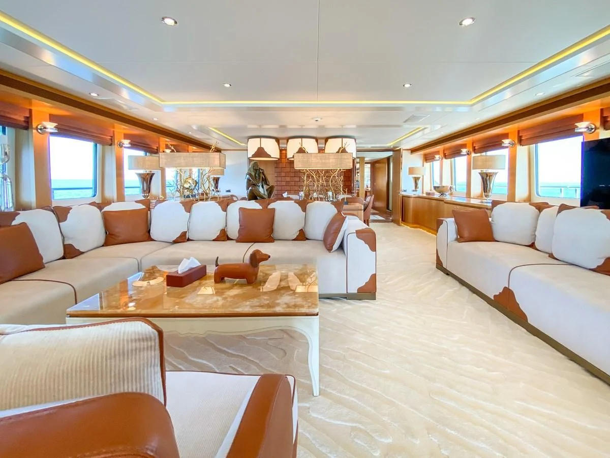 a large living room with a large open floor plan aboard SHARKFINN Yacht for Sale