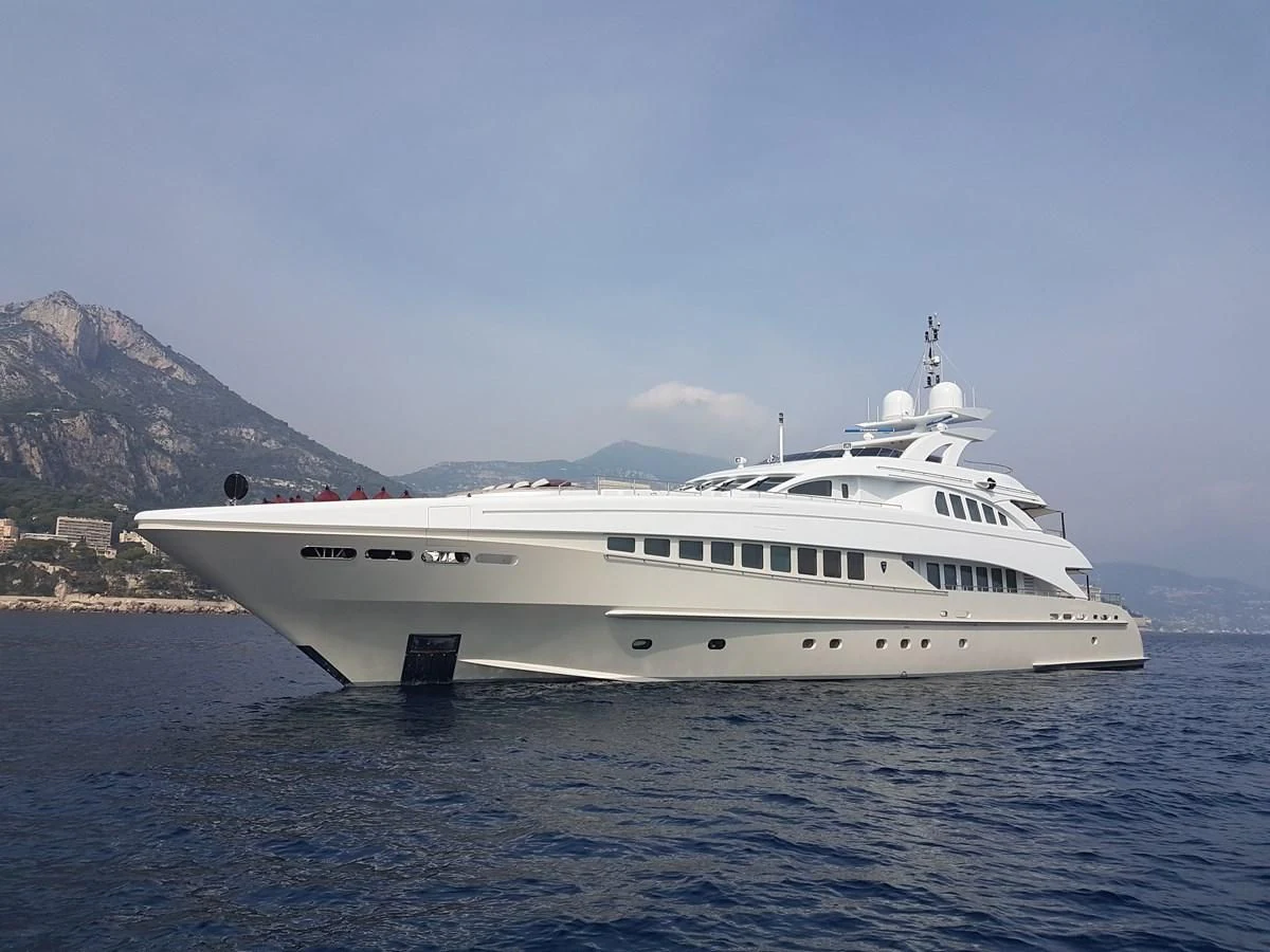 a white yacht in the water aboard SHARKFINN Yacht for Sale