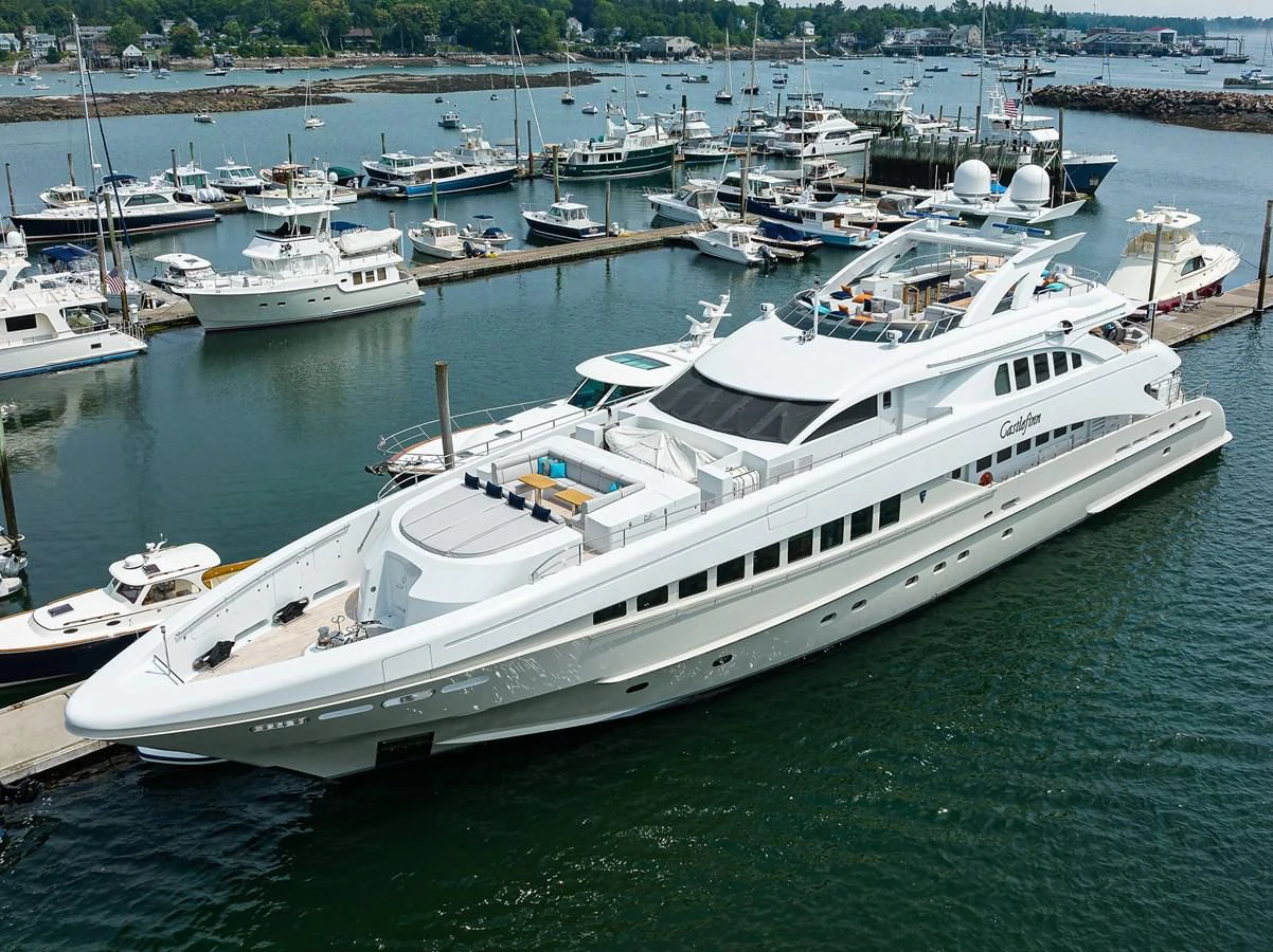 a large white yacht in the water aboard SHARKFINN Yacht for Sale