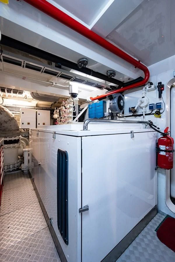 a machine in a room aboard SHARKFINN Yacht for Sale
