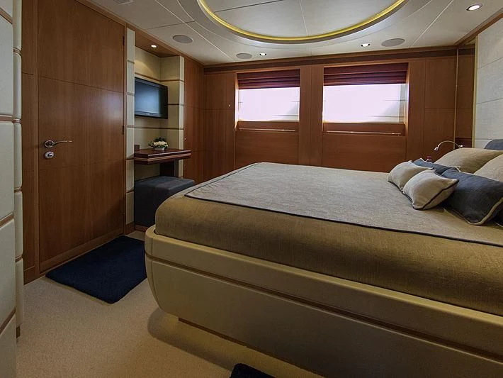 a bed in a room aboard SHARKFINN Yacht for Sale