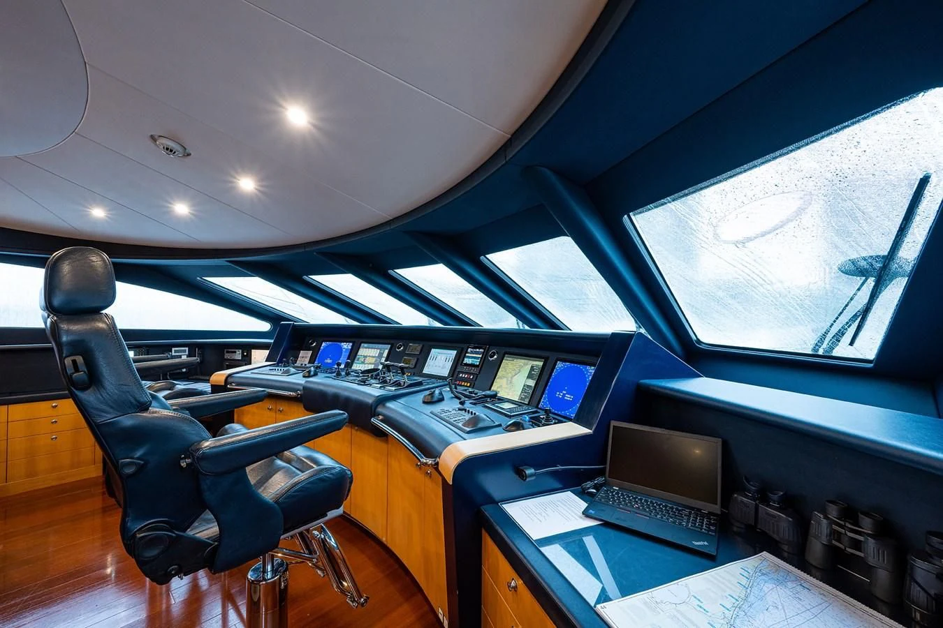 a room with computers and monitors aboard SHARKFINN Yacht for Sale