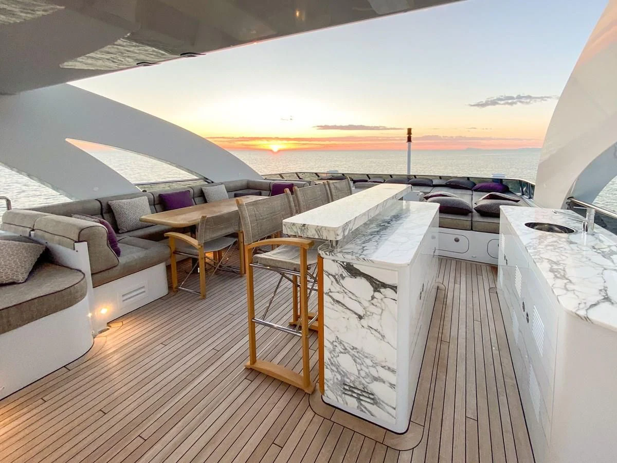 a deck with a view of the ocean and the deck aboard SHARKFINN Yacht for Sale
