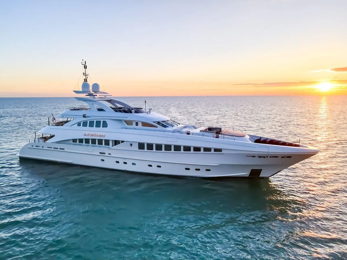 a white yacht in the water aboard SHARKFINN Yacht for Sale