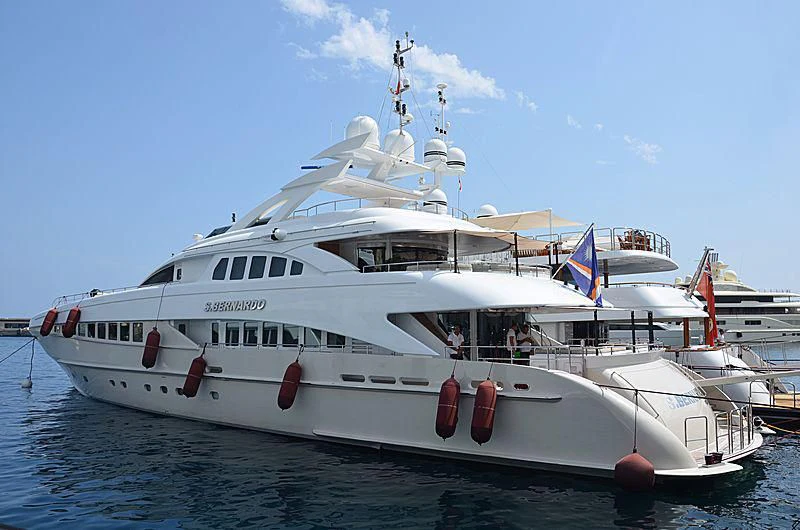 a large white boat in the water aboard SHARKFINN Yacht for Sale