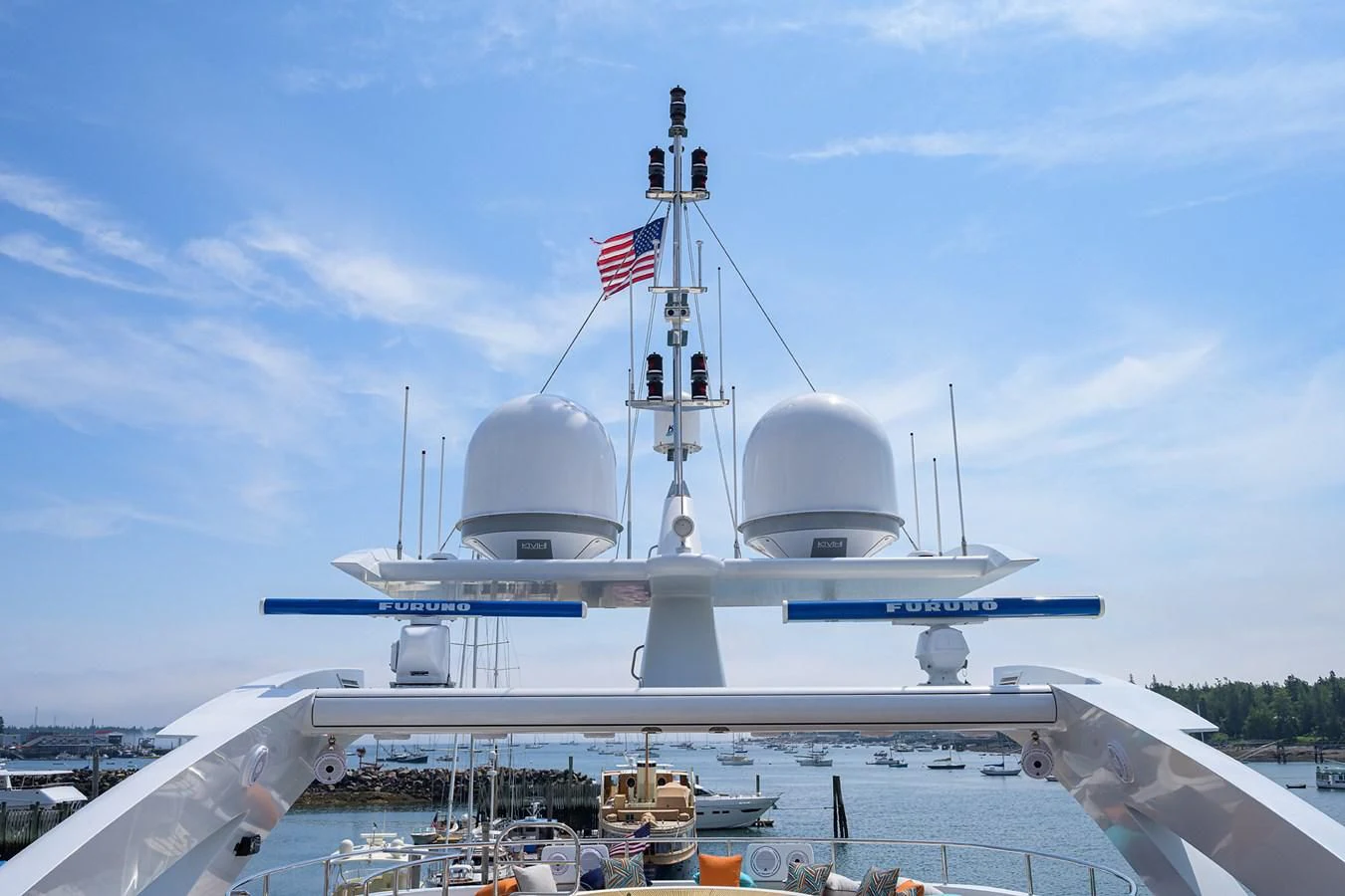 a large white ship with a flag on it aboard SHARKFINN Yacht for Sale