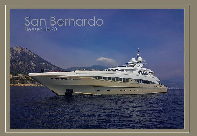 a white yacht in the water aboard SHARKFINN Yacht for Sale