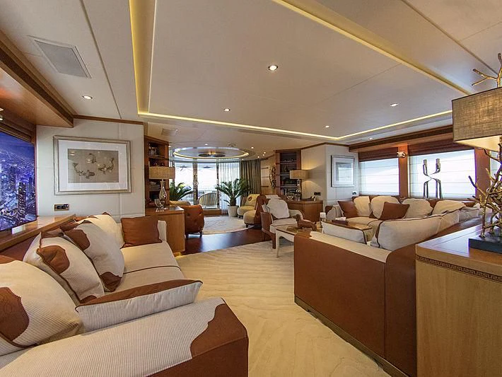 a living room with a large window aboard SHARKFINN Yacht for Sale