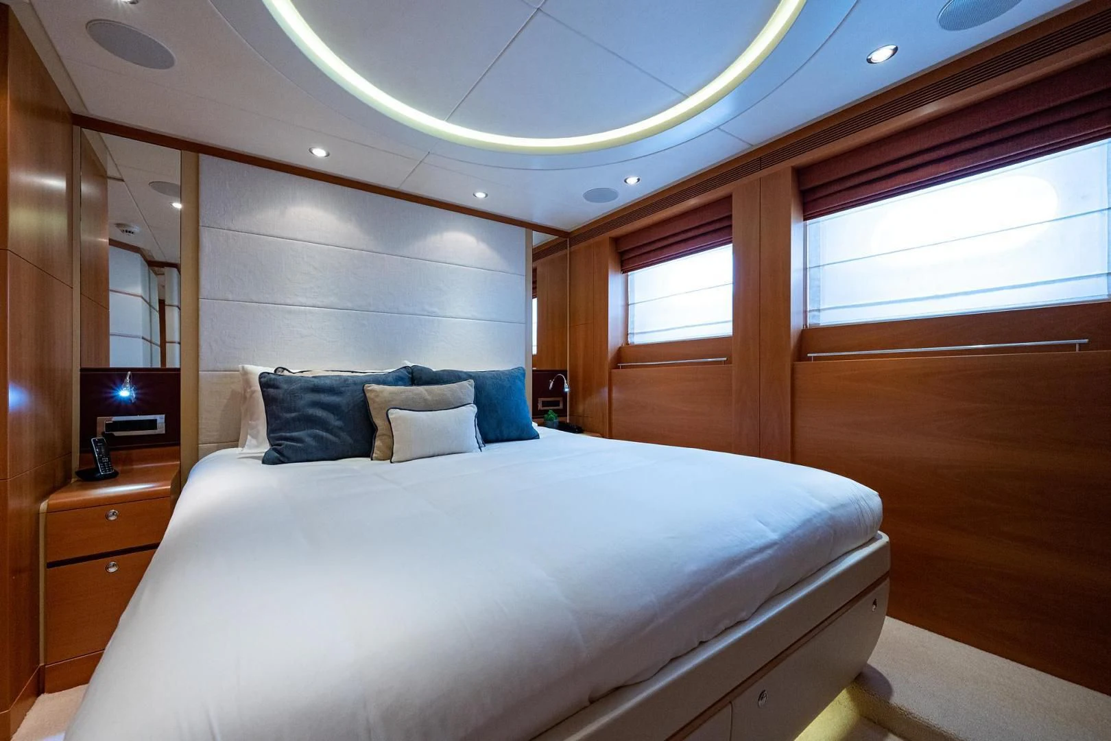 a bed in a room aboard SHARKFINN Yacht for Sale