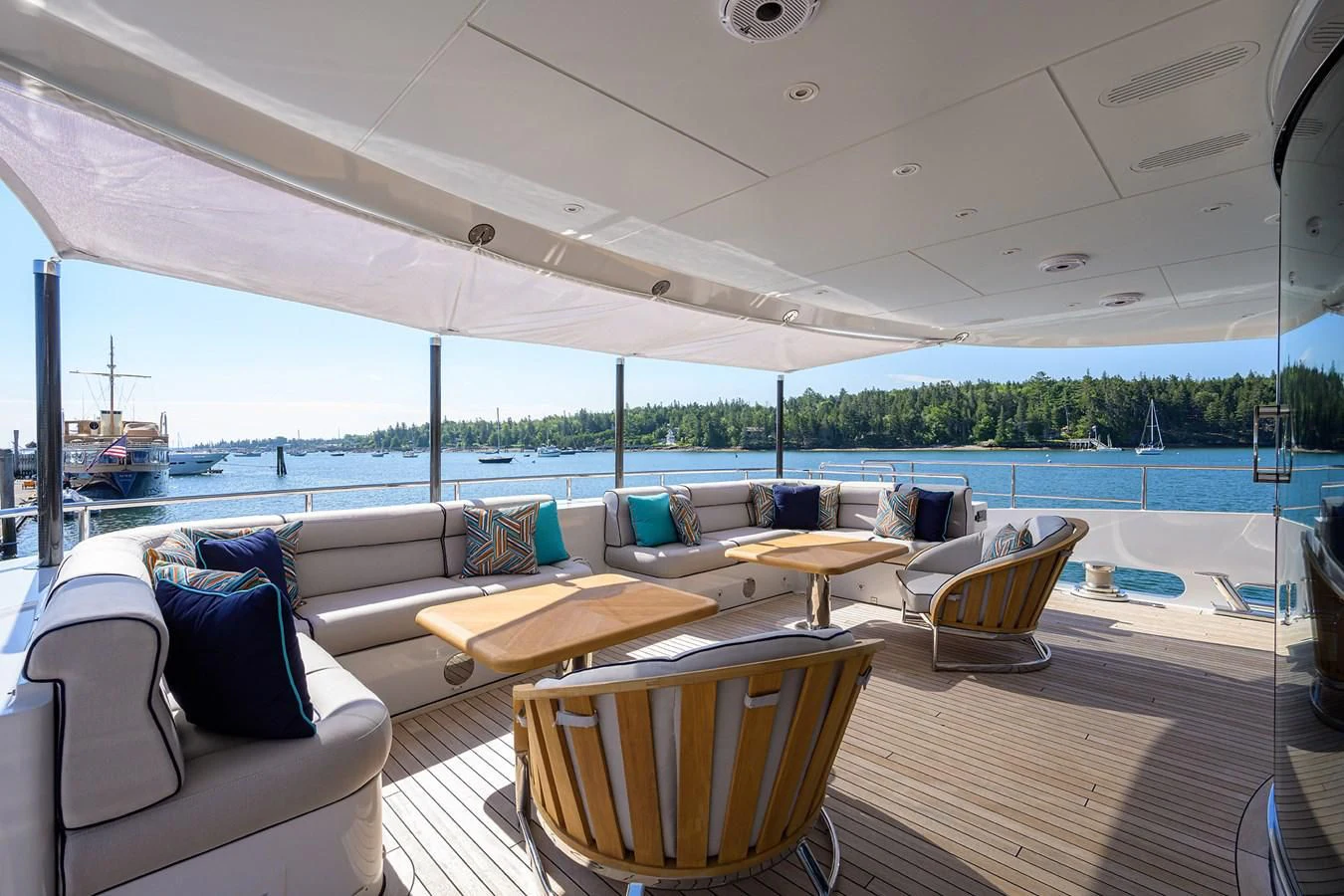 a large living room with a large body of water aboard SHARKFINN Yacht for Sale