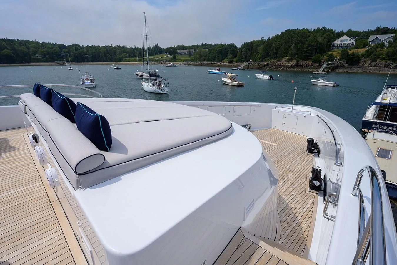 a boat is parked on the side of a dock aboard SHARKFINN Yacht for Sale